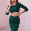 Set of blouses with a green skirt