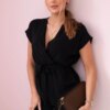 Short black jumpsuit with a tie at the waist