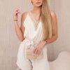 Short jumpsuit with decorative beige lace