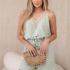 Short jumpsuit with decorative lace dark mint