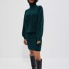 Skirt knitted with a cable