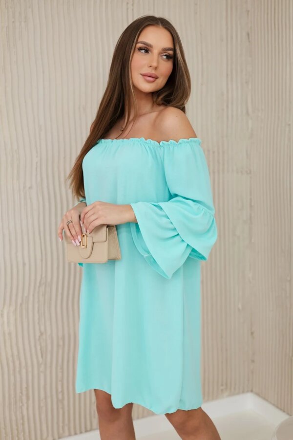 Spanish dress with frills on the mint sleeve