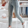 Spodnie damskie jeansowe slim fit z paskiem SLIMVISA niebieskie Dstreet