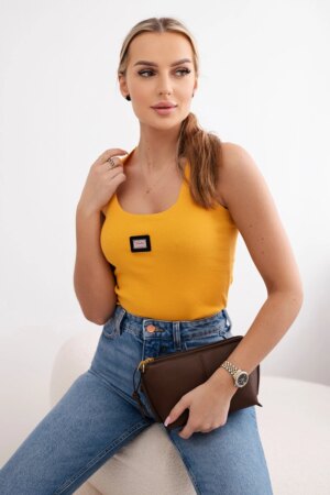 Striped blouse with a metal mustard plate