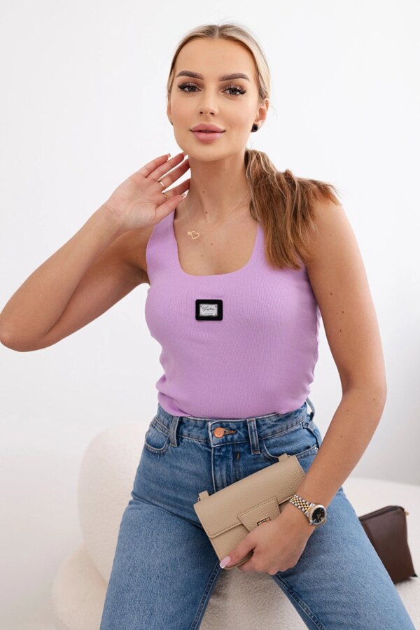 Striped blouse with a purple metal plate