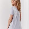Stylish light gray tunic with wings on the back in white