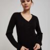 Sweater decorated with metallic thread