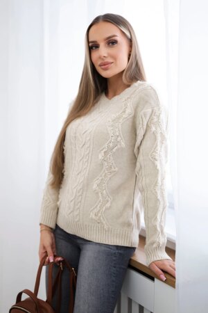 Sweater with beige weave of braids
