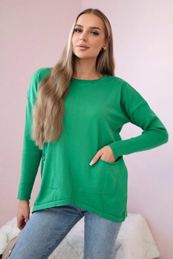 Sweater with front pockets in light green color