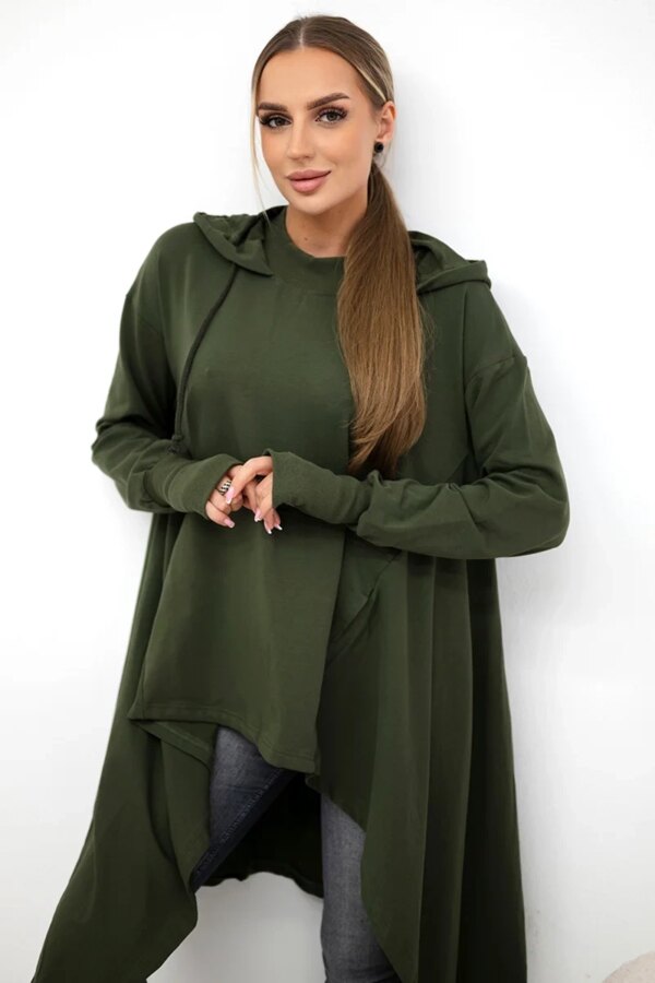 The blouse flars at the bottom in khaki