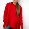 The blouse flars red at the bottom