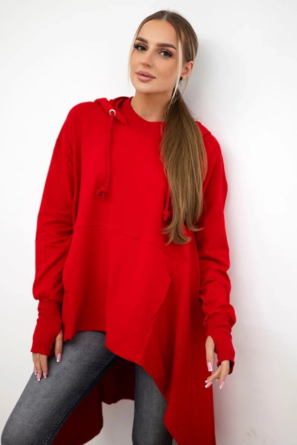 The blouse flars red at the bottom