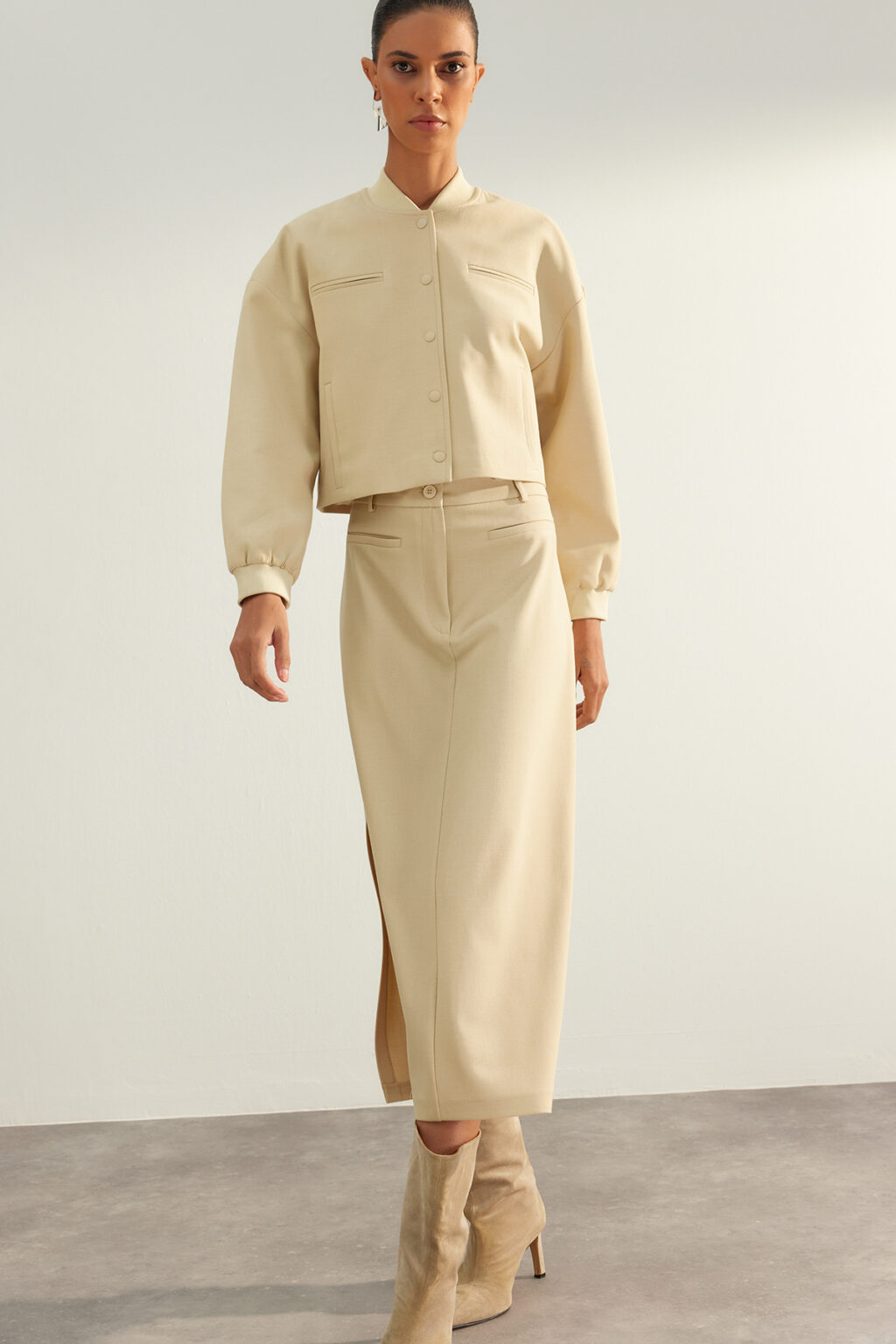 Trendyol Beige Limited Edition High Quality Faux Leather Slit Detailed Midi Woven Skirt