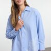 Trendyol Light Blue Oversize Wide Fit Woven Shirt with Embroidery Detail on the Hem