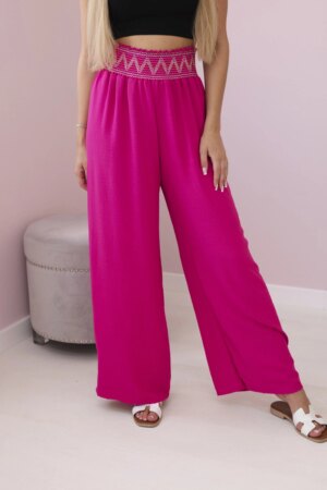 Trousers with a wide elastic waistband in fuchsia