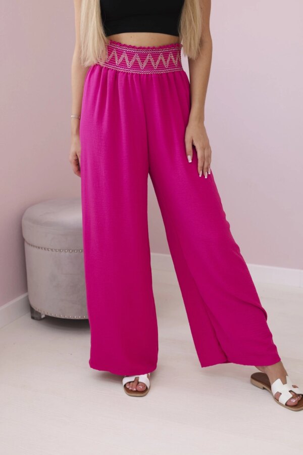 Trousers with a wide elastic waistband in fuchsia