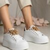 UR/CEO Black and white sneakers adorned with a butterfly with rhinestones Kariba