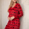 Velvet dress with a decorative red pattern