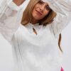White shirt with openwork sleeves