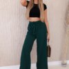 Wide-waisted trousers in dark green colour