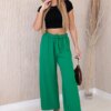Wide-waisted trousers in green colour
