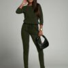 Women's jumpsuit fastened at the back with a khaki zipper