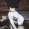 Women's sweatpants with wht/blk/wht button