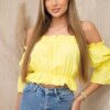 Yellow blouse over the shoulder