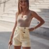 Yellow women's high-waisted shorts