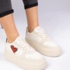 marka niezdefiniowana Beige women's sneakers with glittery heart Laira