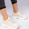 marka niezdefiniowana Beige women's sneakers with gold accents Kella
