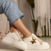 marka niezdefiniowana White-beige sneakers decorated with glitter and a star Taleda