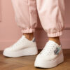 marka niezdefiniowana White sneakers with a blue heart and a zircon pin Lerisol