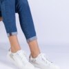 marka niezdefiniowana White women's sneakers with embossing and glitter Laneta